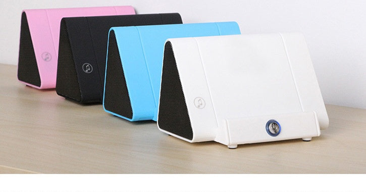 Mobile phone stand speaker